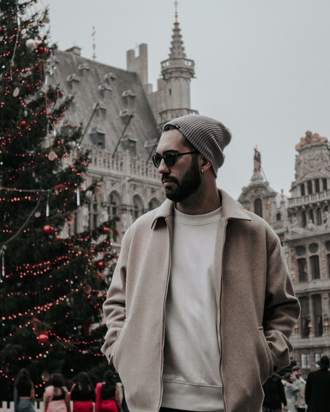 Portrait of a Belgian man in his 40s, editorial trainer, glasses, smart casual jacket
